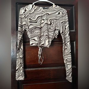 Size Large! Super cute, and stretchy material!